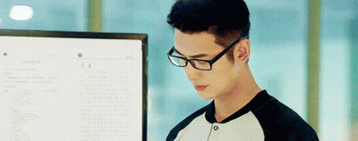 Woman In White Shirt Holding Sign GIF
