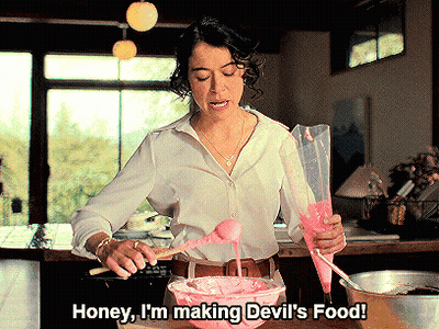 Woman In White Shirt Making Devil's Food GIF