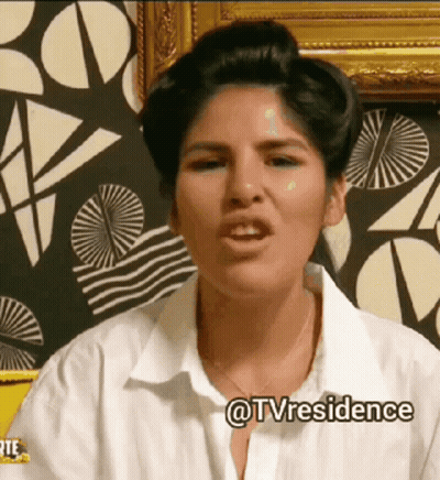 Woman In White Shirt Making Funny Face @Tvresidence GIF