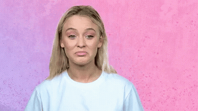 Woman In White Shirt Making Sad Face GIF