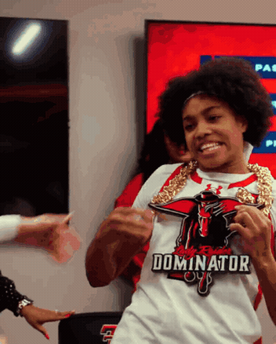 Woman In White Shirt Saying Dominator GIF