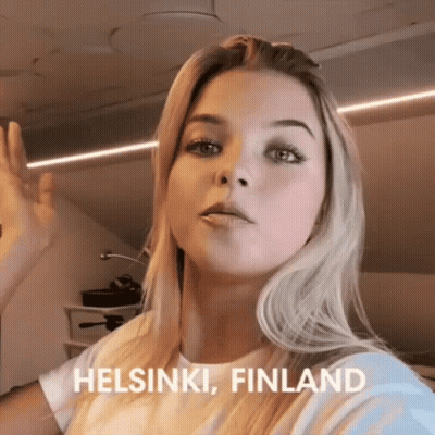 Woman In White Shirt Saying Helsinki Finland GIF