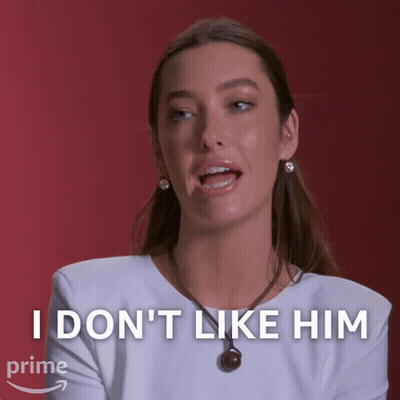 Woman In White Shirt Saying I Don't Like Him GIF