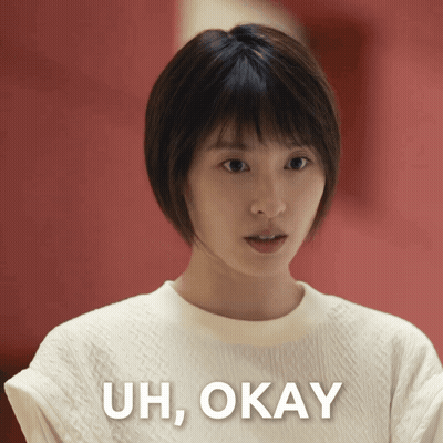 Woman In White Shirt Saying Uh Okay GIF