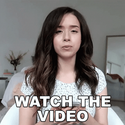 Woman In White Shirt Says Watch The Video GIF