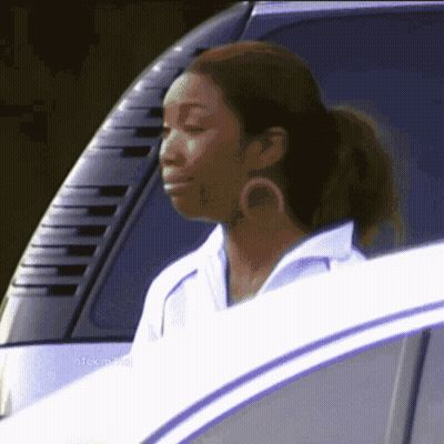 Woman In White Shirt Sitting In Car GIF