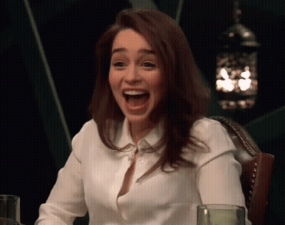 Woman In White Shirt Sitting With Mouth Open GIF
