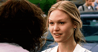 Woman In White Shirt Smiling At Man GIF