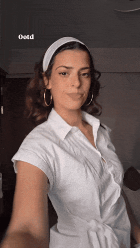 Woman In White Shirt Taking Selfie With OOTD GIF