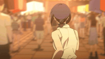 Woman In White Shirt Walking In Crowded Street GIF