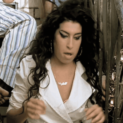 Woman In White Shirt With Amanda Necklace GIF