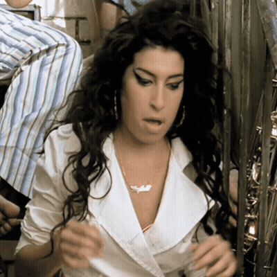 Woman In White Shirt With I Love You Necklace GIF