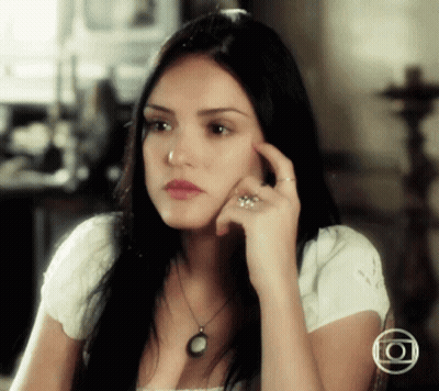 Woman In White Shirt With Necklace And Ring GIF