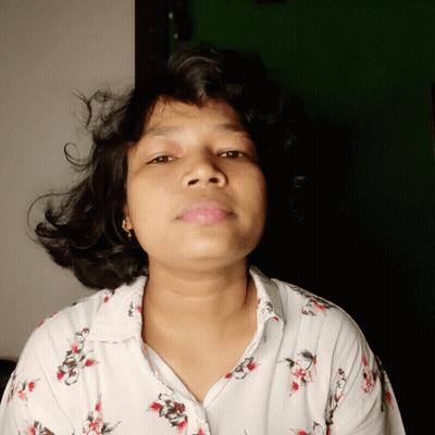 Woman In White Shirt With Red Flowers GIF