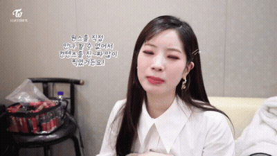 Woman In White Shirt With Twice Logo GIF
