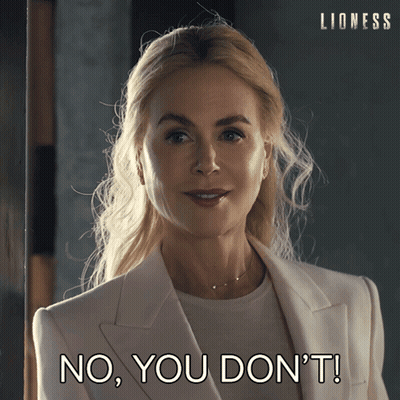 Woman In White Suit Saying No You Don't GIF