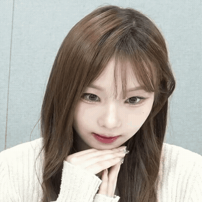 Woman In White Sweater Close Up GIF