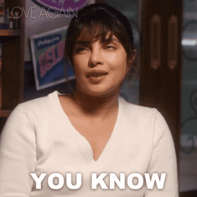 Woman In White Sweater Saying You Know GIF