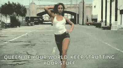 Woman In White Tank Top And Black Shorts GIF
