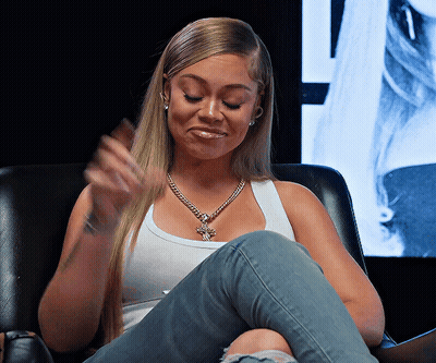 Woman In White Tank Top And Cross Necklace GIF