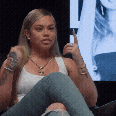 Woman In White Tank Top And Jeans GIF
