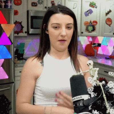 Woman In White Tank Top At Sandad Microphone GIF