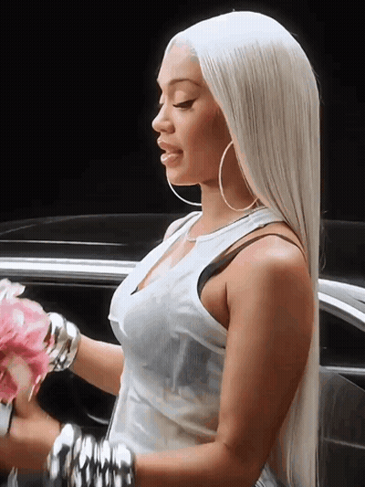 Woman In White Tank Top Holding Bouquet GIF