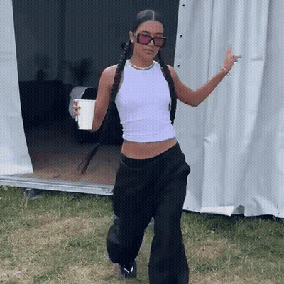 Woman In White Tank Top Holding Coffee GIF