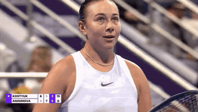 Woman In White Tank Top Holding Tennis Racquet GIF