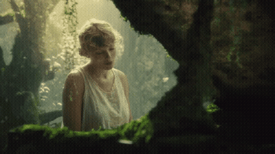 Woman In White Tank Top In Cave GIF