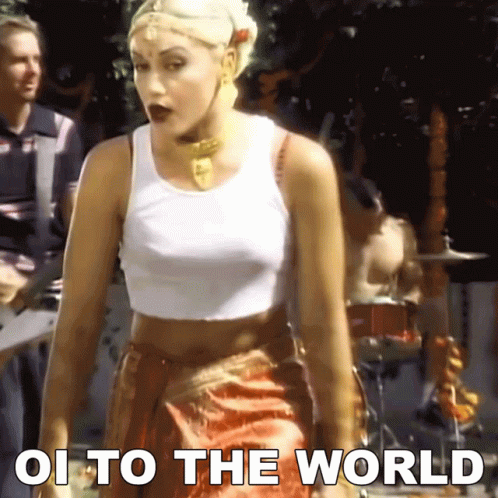 Woman In White Tank Top Saying Oi To The World GIF