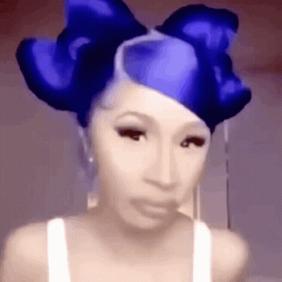 Woman In White Tank Top With Blue Bow GIF