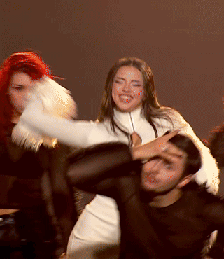 Woman In White Top Dancing With Man GIF