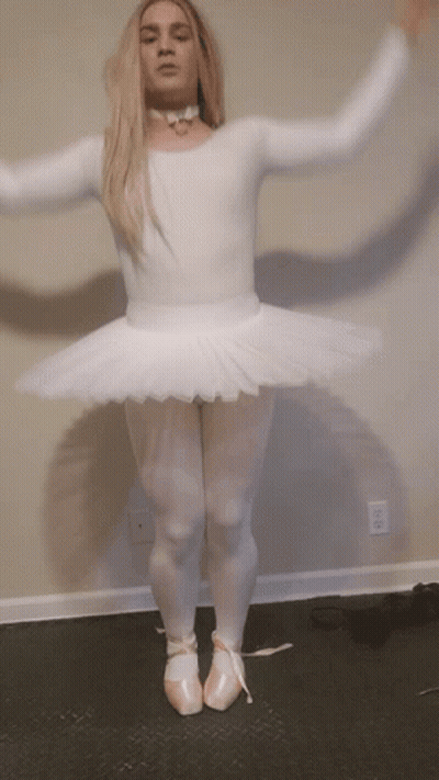 Woman In White Tutu And Pink Pointe Shoes Dancing GIF