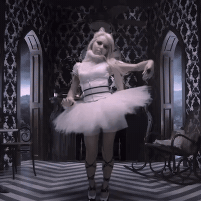 Woman In White Tutu Dancing On Striped Floor GIF