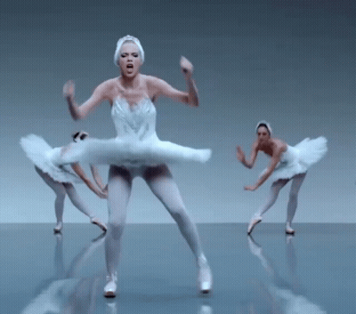 Woman In White Tutu Dancing With Two Others GIF