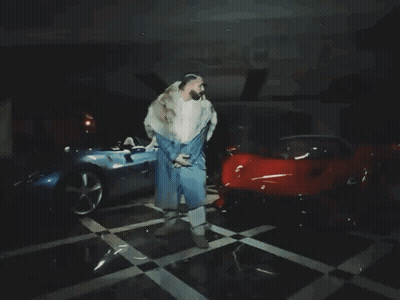 Woman In White Vans Shirt Standing In Doorway GIF