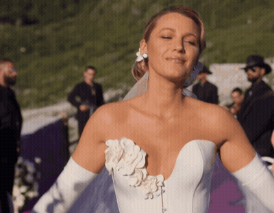 Woman In White Wedding Dress With Flower GIF