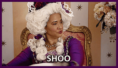 Woman In White Wig Saying Shoo GIF