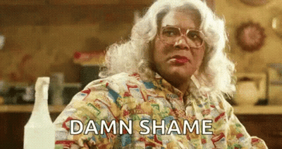 Woman In Wig And Glasses Saying Damn Shame GIF