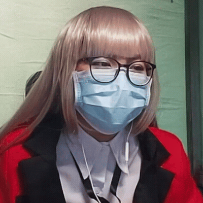Woman In Wig And Mask With Glasses GIF