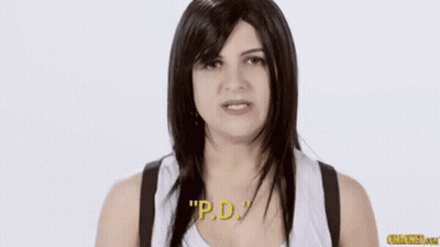 Woman in Wig and White Tank Top Saying Downs