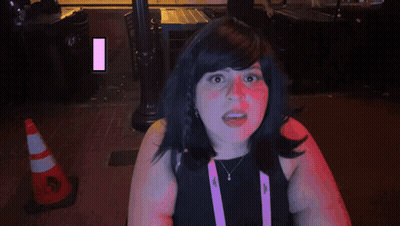 Woman In Wig Saying Good GIF
