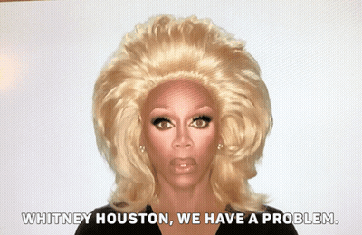 Woman In Wig Saying Whitney Houston We Have A Problem GIF