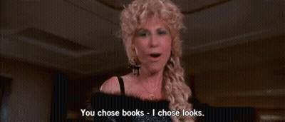 Woman in Wig Saying You Chose Books I Chose Looks
