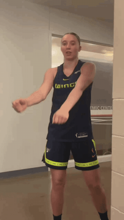 Woman In Wing Jersey And Shorts Dancing GIF