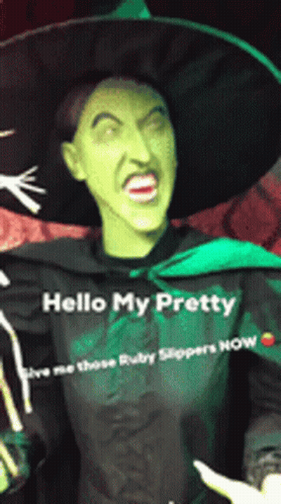Woman In Witch Costume Saying Hello My Pretty GIF