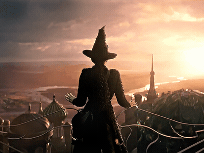 Woman In Witch Hat On Balcony Overlooking City GIF