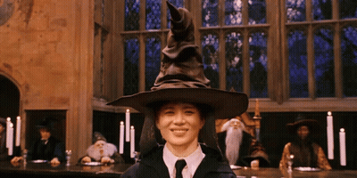 Woman In Wizard Hat Smiling GIF