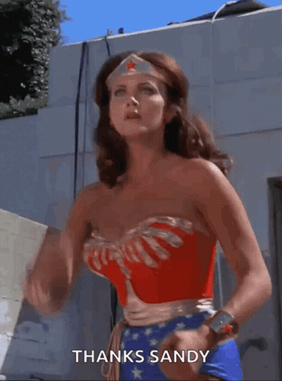 Woman In Wonder Woman Costume Saying Thanks GIF